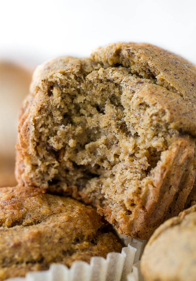 Flourless Vegan Banana Muffins - so light, tender, and loaded with flavour, you’d never know they were made without flour, oil, eggs, or refined sugar!! | runningwithspoons.com #vegan #glutenfree #recipe #snack #breakfast #healthy