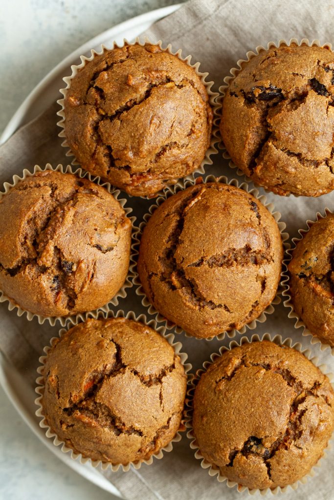 Easy Morning Glory Muffins that are so tender and loaded with flavour, you’d never know they were made without flour, oil, eggs, or refined sugar.